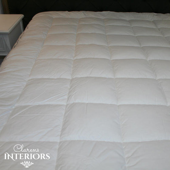 For the ultimate in comfort, the mattress topper provides a cushion of comfort and softness that supports every move. Made with a deep fitting, super stretch skirt to fit most mattress depths for a snug and secure fit. Fully machine washable.